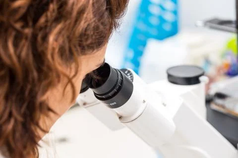 Close up of scientist at microscope Fotos de archivo
