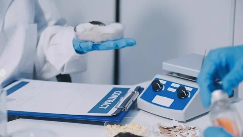 Close-up of scientist performing laboratory testing on a white mouse in a m.. Stock Footage 336564855