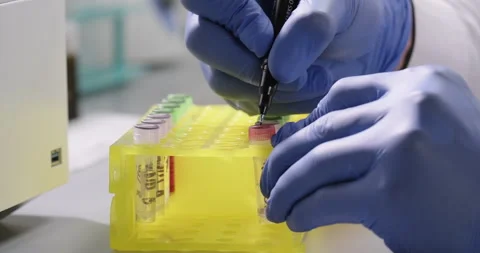Close-up scientist signs test tubes samples. Laboratory, scientific experiment Stock Footage 265578882