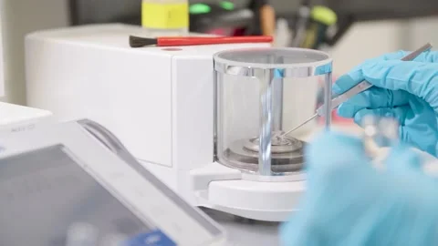 Close up, Scientist takes a Aluminium Sample, Focus Pulling Vídeos de archivo 145055770