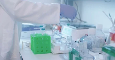 Close up of a Scientist working in a medical laboratory conducting experiments Stock Footage