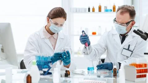 Close up. scientists are testing a new vaccine. Stock Photos