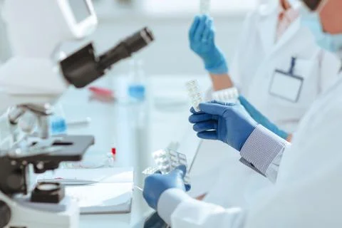 Close up. scientists are testing a new drug . Stock Photos