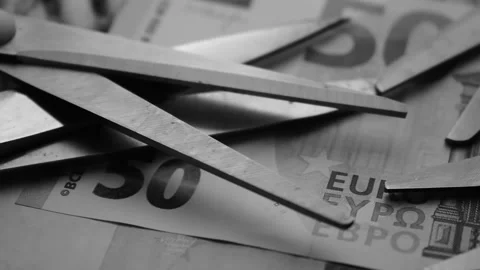 Close up on scissors over Euro banknotes Stock Footage 135356714