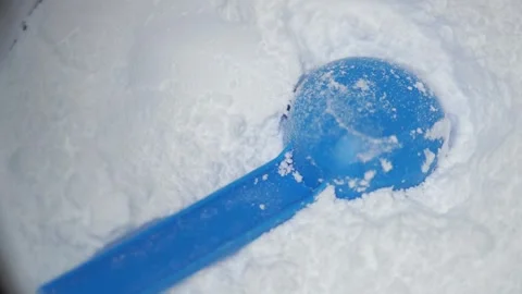 Close up of a scoop in a creatine powder Stock Footage 311755874
