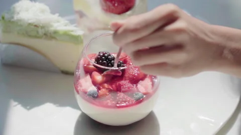 Close up Scooping Desserts in the light slow motion 100fps Video stock 156172563