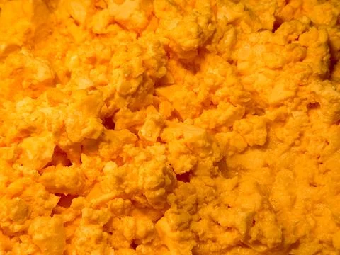Close up of scrambled eggs texture, banner for food and breakfast concepts Stock Photos