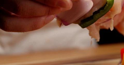 Close up of scrambling chicken and vegetables, making kebab Видео 126257814