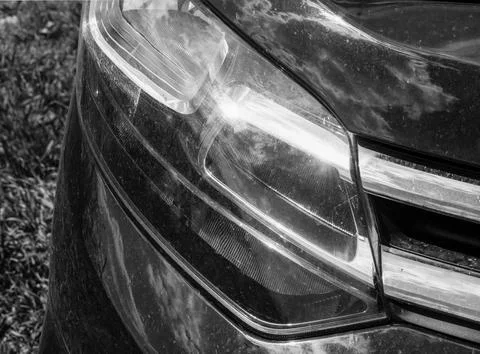 Close up of a scratched car headlight Photos