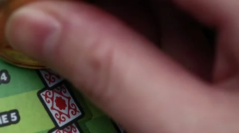 Close-up of Scratching lottery ticket Stock Footage 56298710