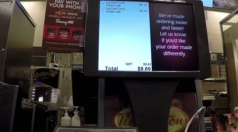 Close up screen of custmer buying hot chocolate at check out counter Stock Footage 45207422