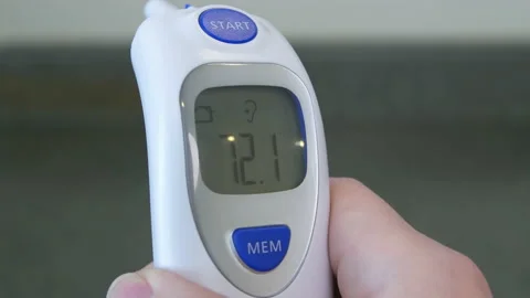Close up on screen of infrared thermometer Stock Footage 142539441