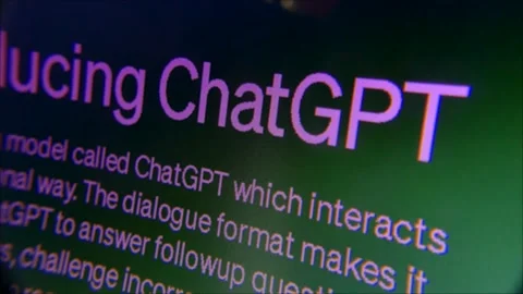 Close up on screen 'Introducing ChatGPT' purple header text - camera dolly Stock Footage 243350035