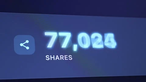 Close-up of a screen showing a high count of shares. Stock Footage 336968055