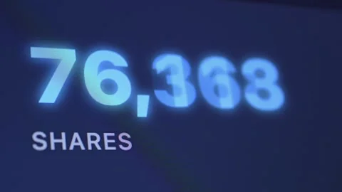 Close-up of a screen showing a high count of shares. Stock Footage 336968059