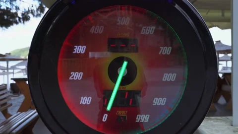 A close-up of the screen of the slot machine with red LED numerals shows the Stock Footage 197047424