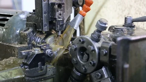Close-Up of Screw and Nut Manufacturing Machinery Stock Footage 340107971