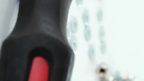 Close-up of screwdriver and screws Stock Footage 300747006