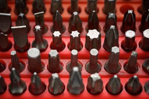 Close-up of screwdriver bits for fastening screws. Stock Photos