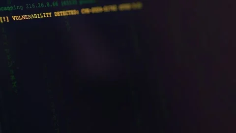 Close-up of scrolling green code symbolizing real-time threat monitoring, data Stock-Footage 332810765