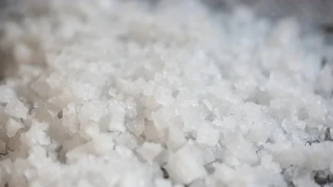 Close up of sea salt on the table Stock Footage 162625400