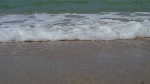 Close up of sea surf splashing Stock Footage 334439097