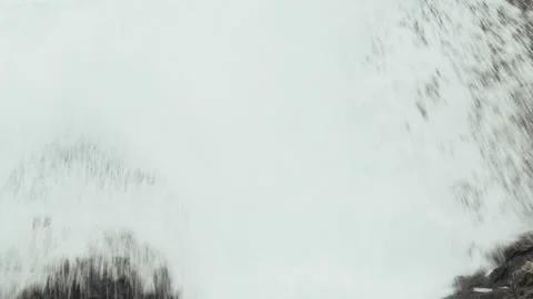 Close-up of sea waves breaking on rocks. White sea foam bubbles on the surface Stock Footage 178955792
