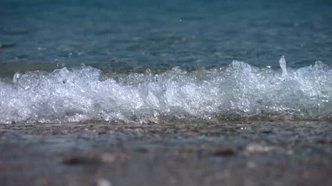 Close up sea waves breaks on shore. Super slow motion 4K Stock Footage 285017235