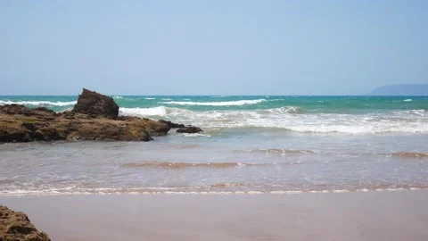 Close up of sea waves, rocks and stones in Morocco, Atlantic ocean. Landscape Stock Footage 246392297