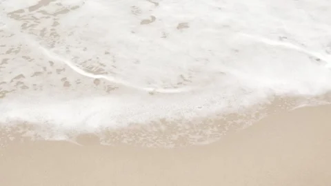 Close up to Sea waves rolling over the fine sand beach, waves break on whit.. Stock Footage 265233267