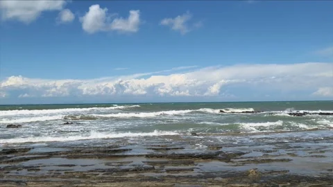 Close-up of Sea Waves on Sandy Beach - Cinematic 4K Stock Footage 331802352