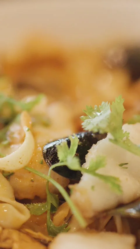 Close-Up of Seafood Chowder Being Eaten With Spoon Stock Footage 314868153