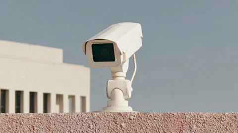 Close-up of a security camera rotating in different directions Video stock 315960420