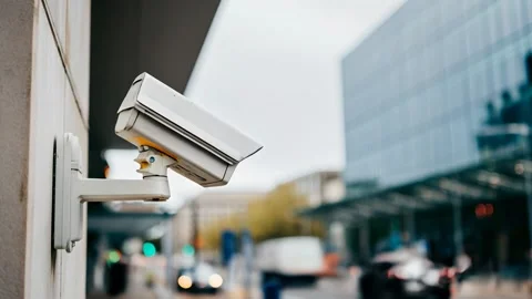 Close-up of a security camera rotating in different directions Stock Footage 315960474