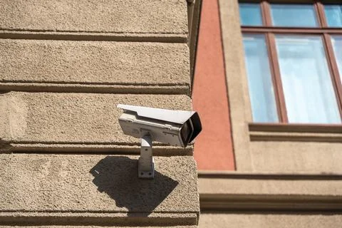 Close Up of Security Camera on Stone Building Stock Photos