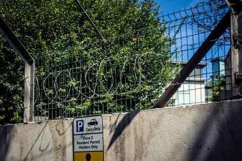 Close-up of security razor wire and barbed wire fence at historic military .. Stock Photos