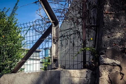 Close-up of security razor wire and barbed wire fence at historic military .. Stock Photos