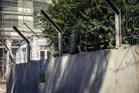 Close-up of security razor wire and barbed wire fence at historic military .. Stock Photos