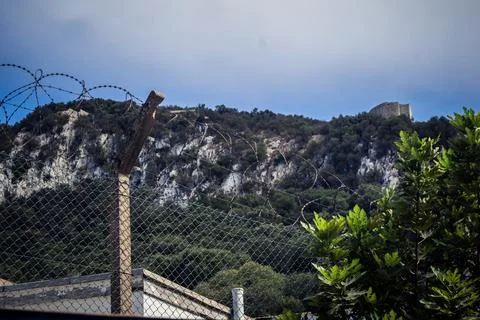 Close-up of security razor wire and barbed wire fence at historic military .. Stock Photos