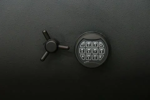 Close-up security safe combination lock, circular keypad with letters numbe.. Stock Photos