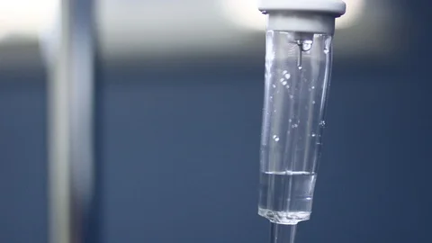 Close up of sedation drip in operating room Stock Footage 113721136