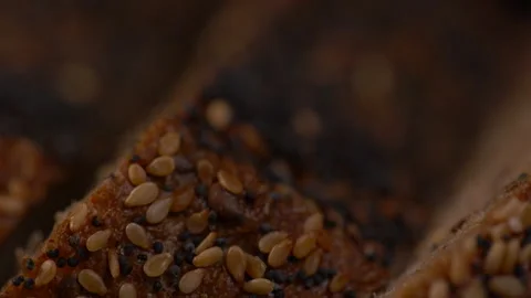 Close Up of Seeds on Whole Wheat Bread Video stock 130267416