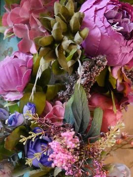 Close up of selection of pretty pastel artificial flowers Stock Photos