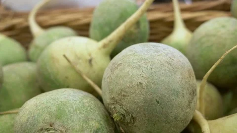 Close-up. Selection of turnip root vegetables in a supermarket Stock Footage 115705912