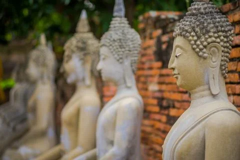 Close up of selective focus Ancient Buddha Statue at WAT YAI CHAI MONGKOL, The Stock Photos