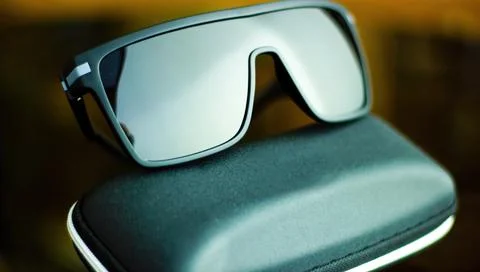 Close up selective focus of Big black stylish wayfarrer sunglasses or shades  Stock Photos