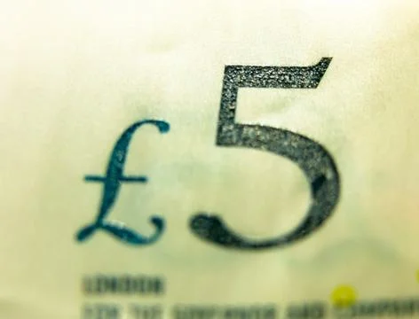 Close up selective focus of five pound note 5 Stock Photos