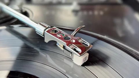 Close up selective focus on Vinyl player on long play or LP Video stock 297889183