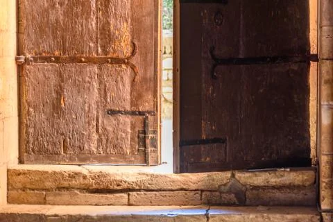 Close up of a semi-open door Stock Photos
