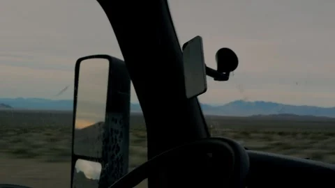 Close-up of semi truck driver side exterior mirror against... Stock Footage 328254444